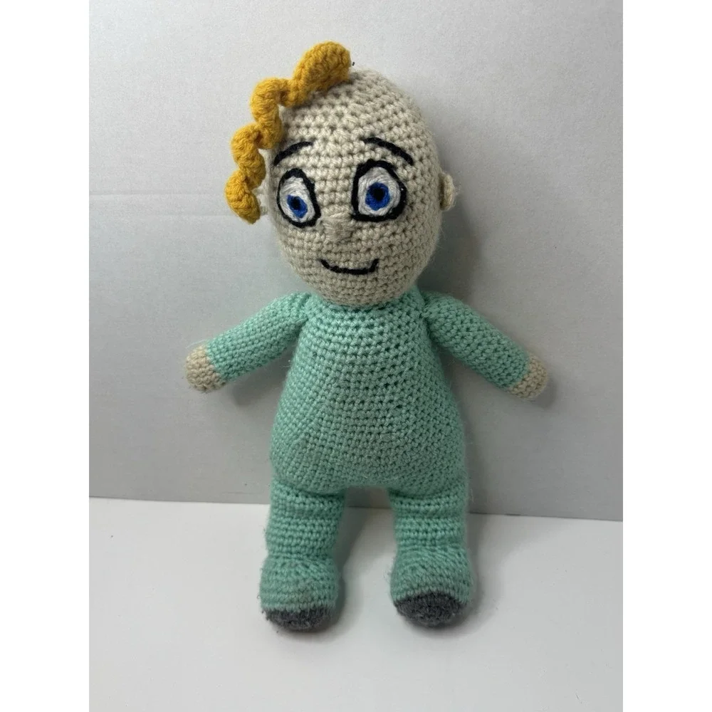 crochet doll of JJ from the children's‎ cartoon Cocomelon.
